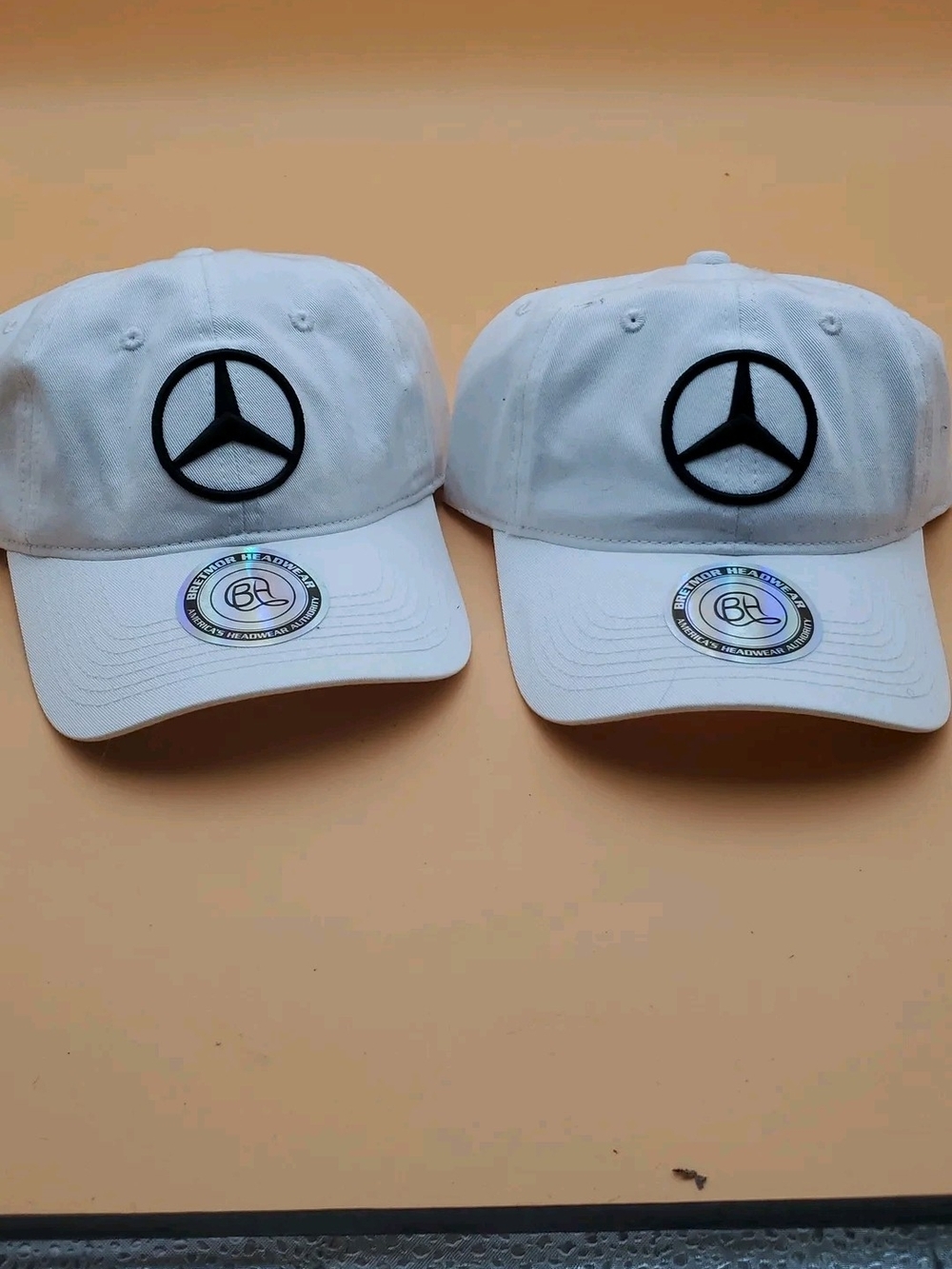 White Baseball Cap with Black Emblem - Classic Casual Hat